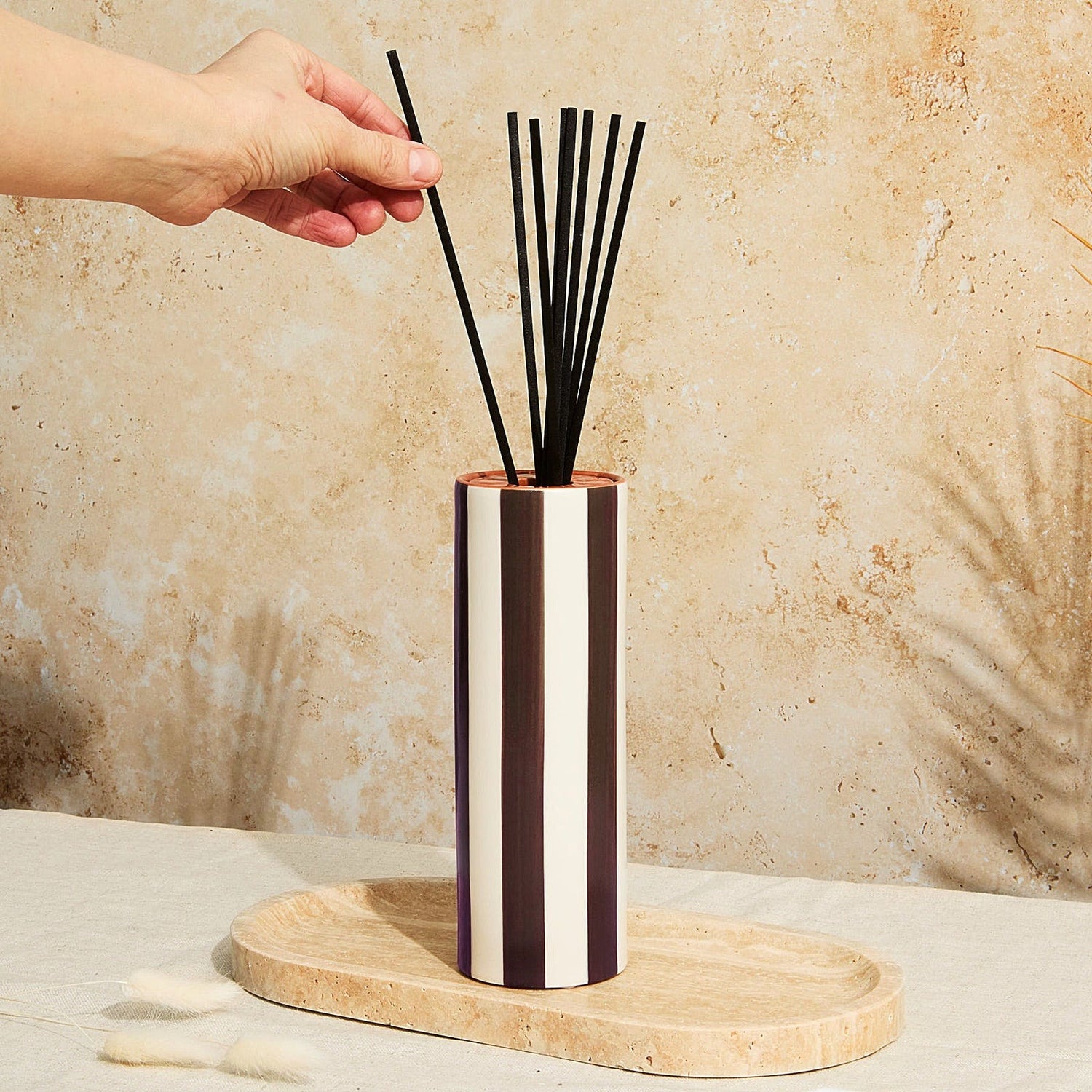 Marrakesh Chocolate Stripe Diffuser in ceramic vessel with tomato leaf fragrance and reeds