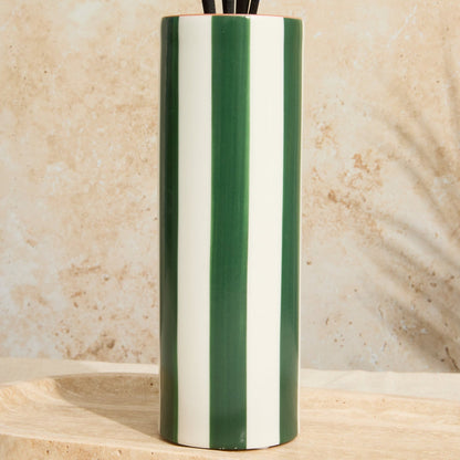 Reusable ceramic diffuser jar with olive striped design and luxurious oud leather scent