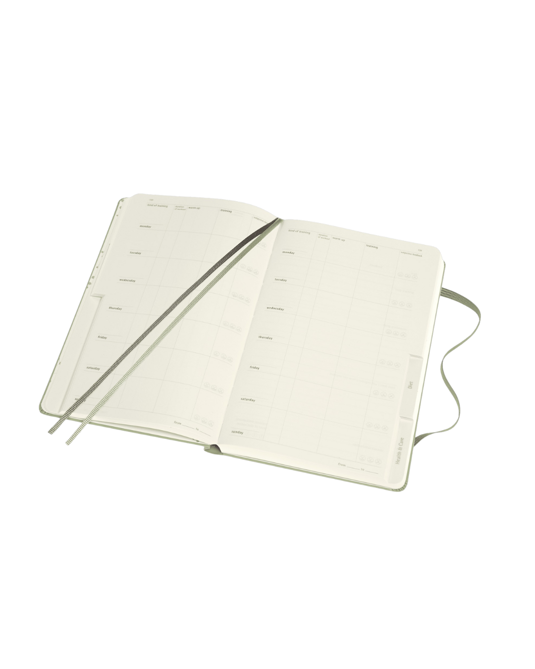 Wellness Journal open, showing two ribbon bookmarks, tabbed sections, and space for tracking habits, goals, and reflections.