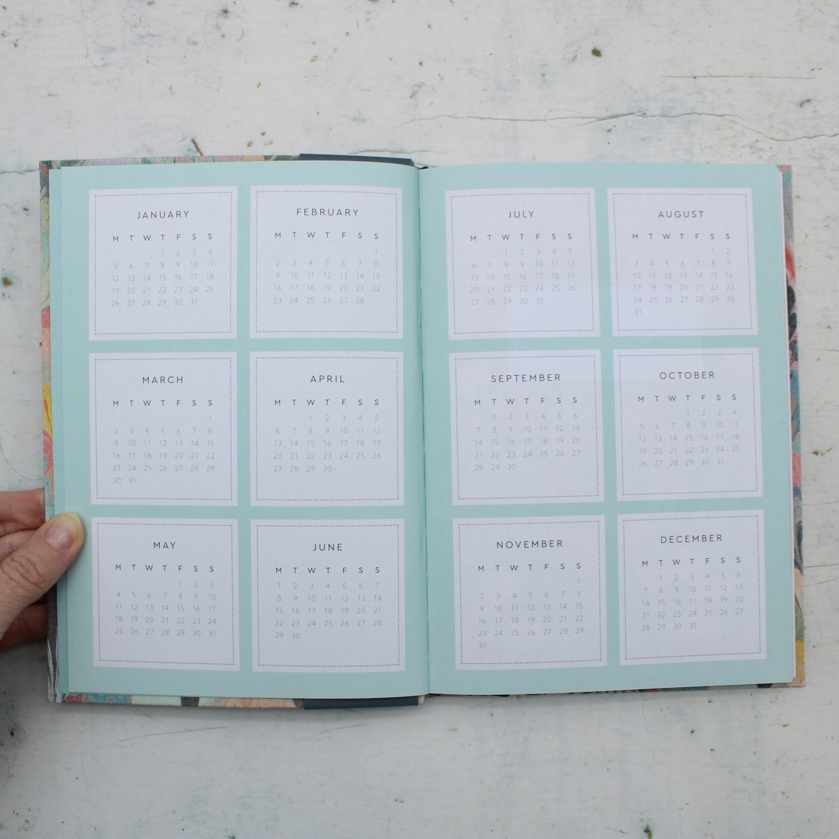 Annula Calendar of the A5 2026 diary with neon floral ornate garden design inspired by V&amp;A archives, 