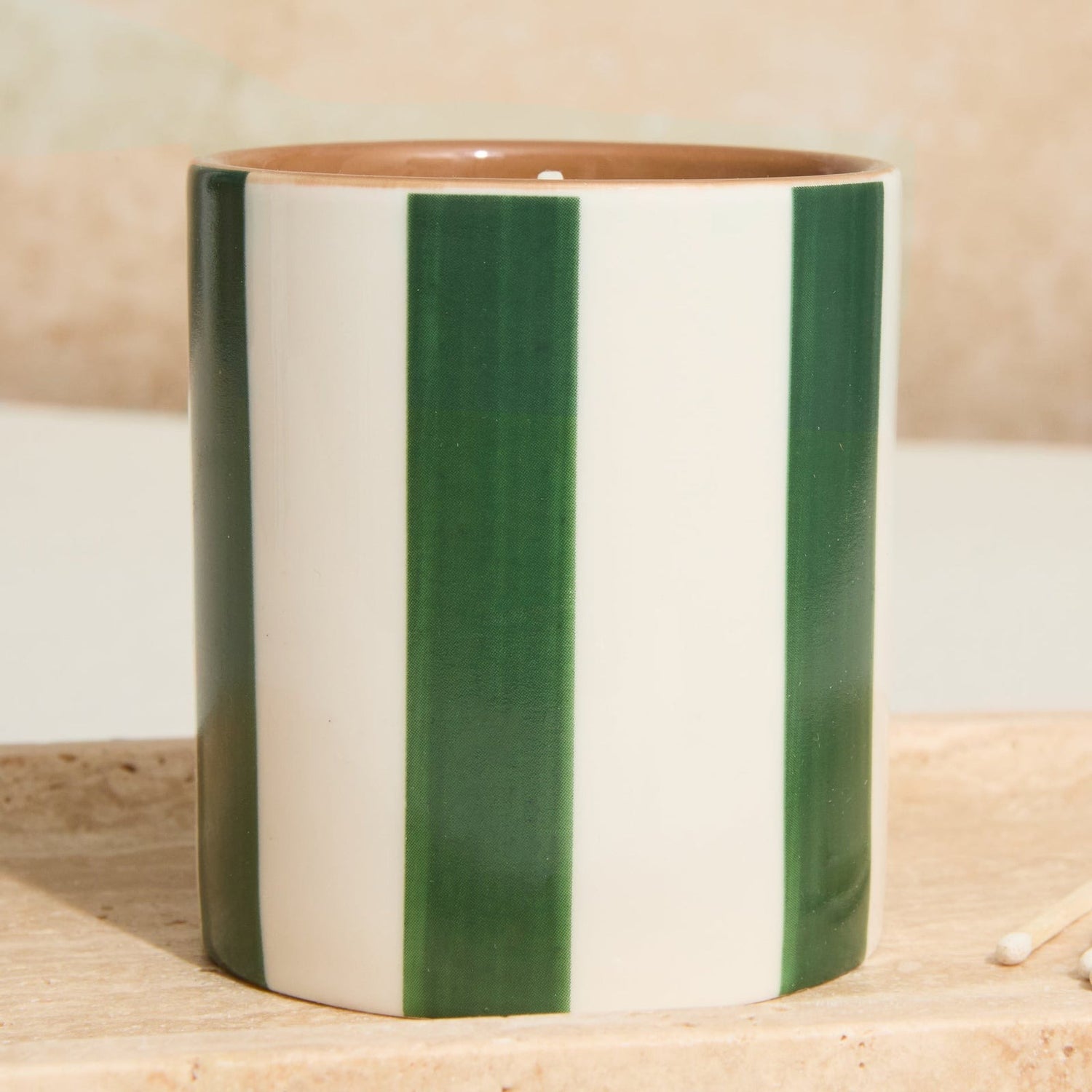 Reusable ceramic candle jar with olive striped design and luxurious oud leather scent