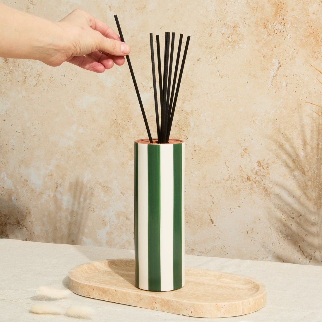 Olive Stripe Diffuser in ceramic vessel with matching lid and oud leather fragrance