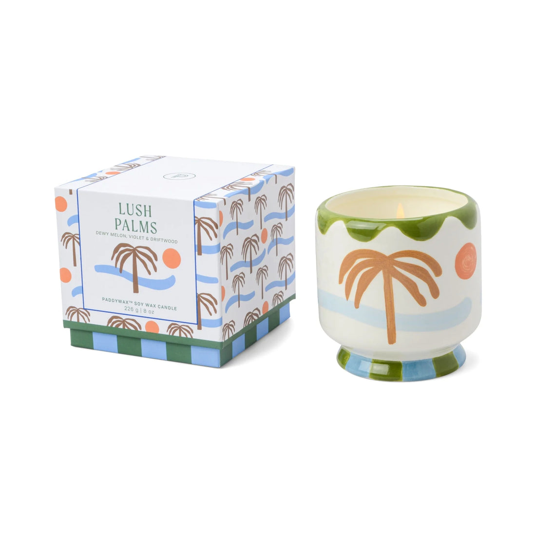 Vegan cruelty-free soy wax candle, 8oz, in a repurposable ceramic jar with palm tree, sun and waves decorations featuring a lush palms fragrance