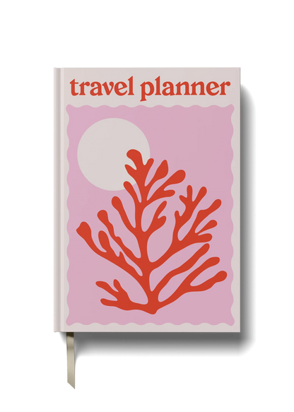 A5 travel planner with red coral and pink cover, featuring a radiant sun and wave motif, ideal for organizing trips, journaling, and travel keepsakes.

