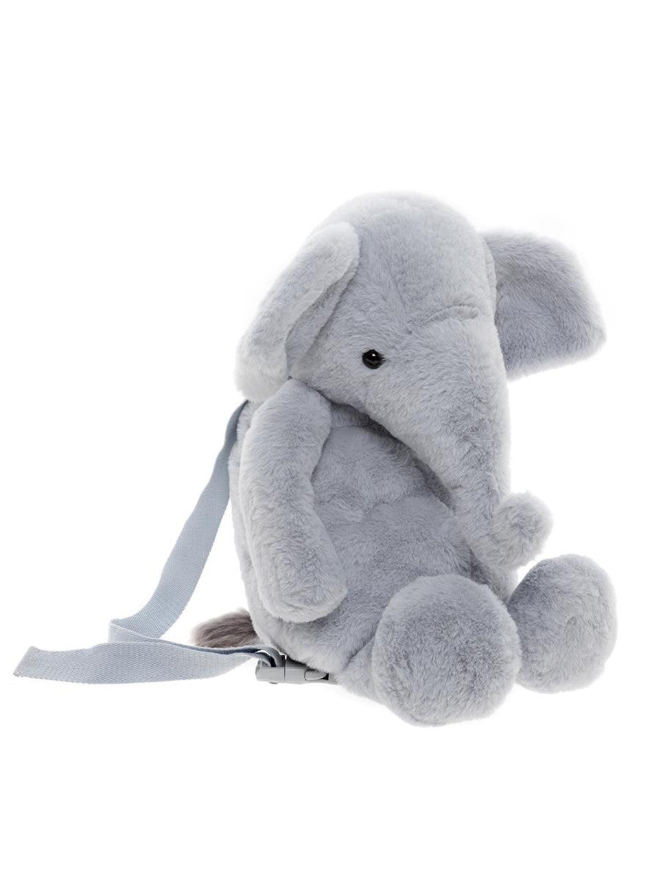 Side View of The Effie Elephant plush backpack in cloudy grey – soft huggable elephant bag for kids, adjustable straps and storage for toys or snacks