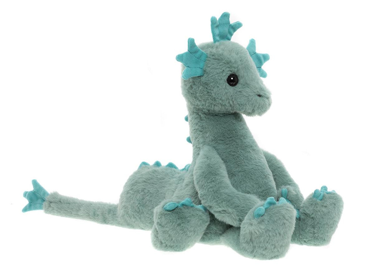 Side view of the Nessie plush toy in seaweed green – soft cuddly stuffed mythical creature for kids, comfort toy and nursery companion
