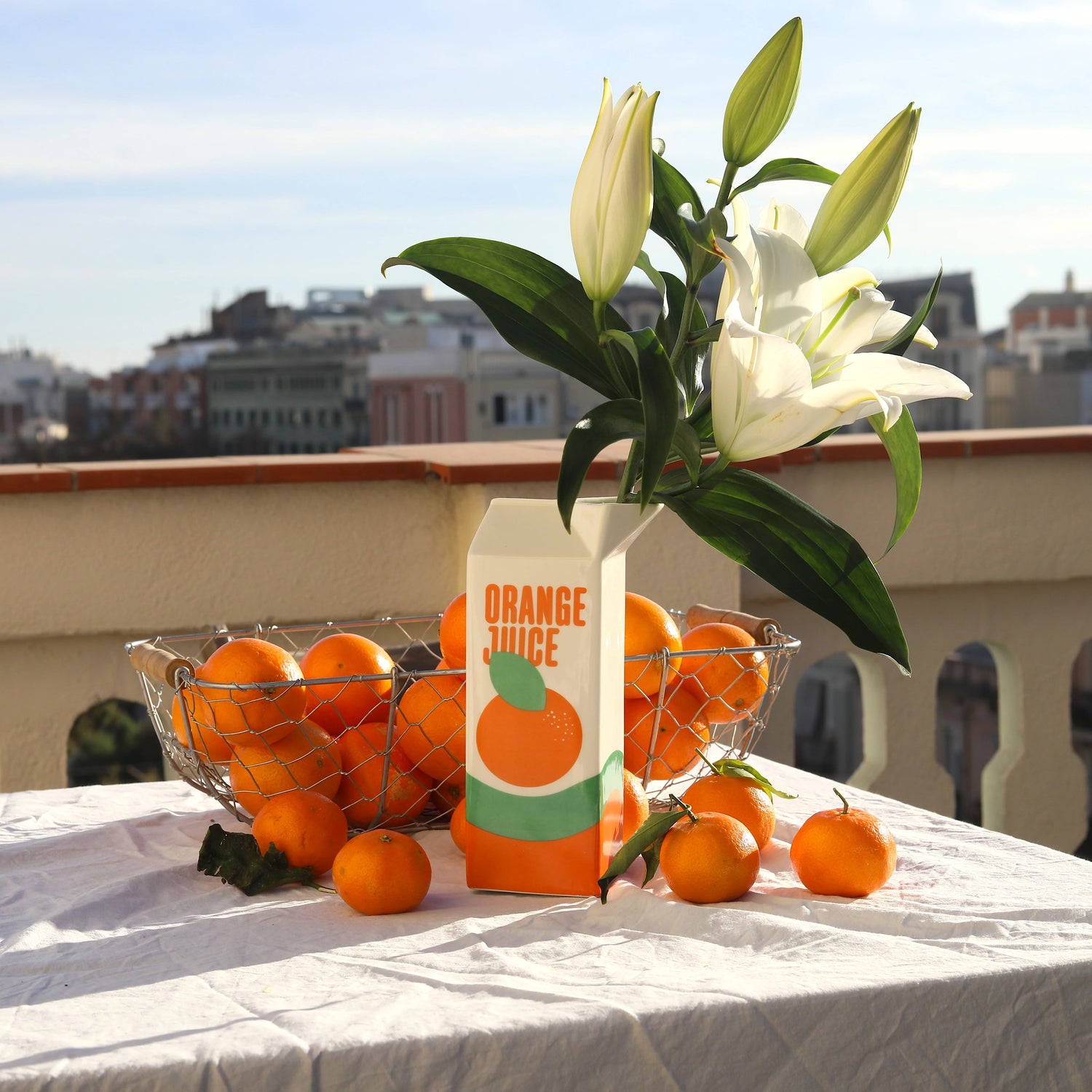 Ceramic Orange Juice Vase – Quirky plant holder shaped like a juice carton, perfect for modern home decor, plant lovers, and playful shelf styling.