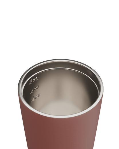 Close-up of the tuscan Bino reusable mug with the inside color silver  on a white background