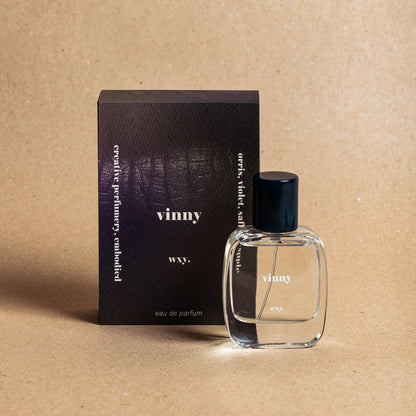 Vinny Eau de Parfum 50ml bottle with the packaging next to it – elegant luxury fragrance