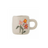 Stoneware mug with floral design on a white background