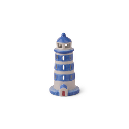Front view of ceramic lighthouse style incense holder and tea light holder on white background
