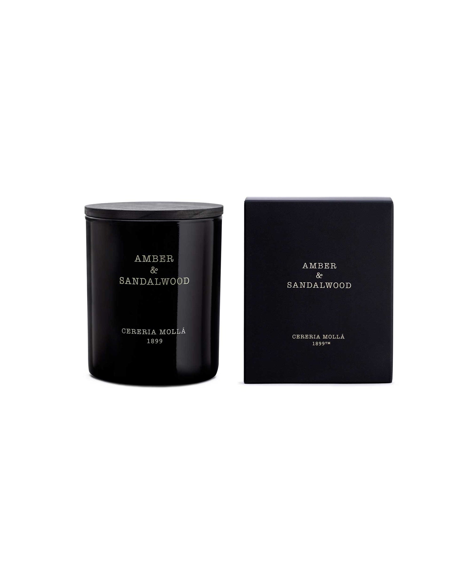 Black glass candle and packaging with &
