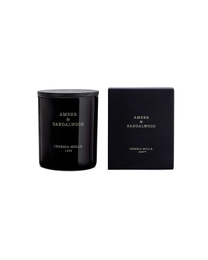 Black glass candle and packaging with &