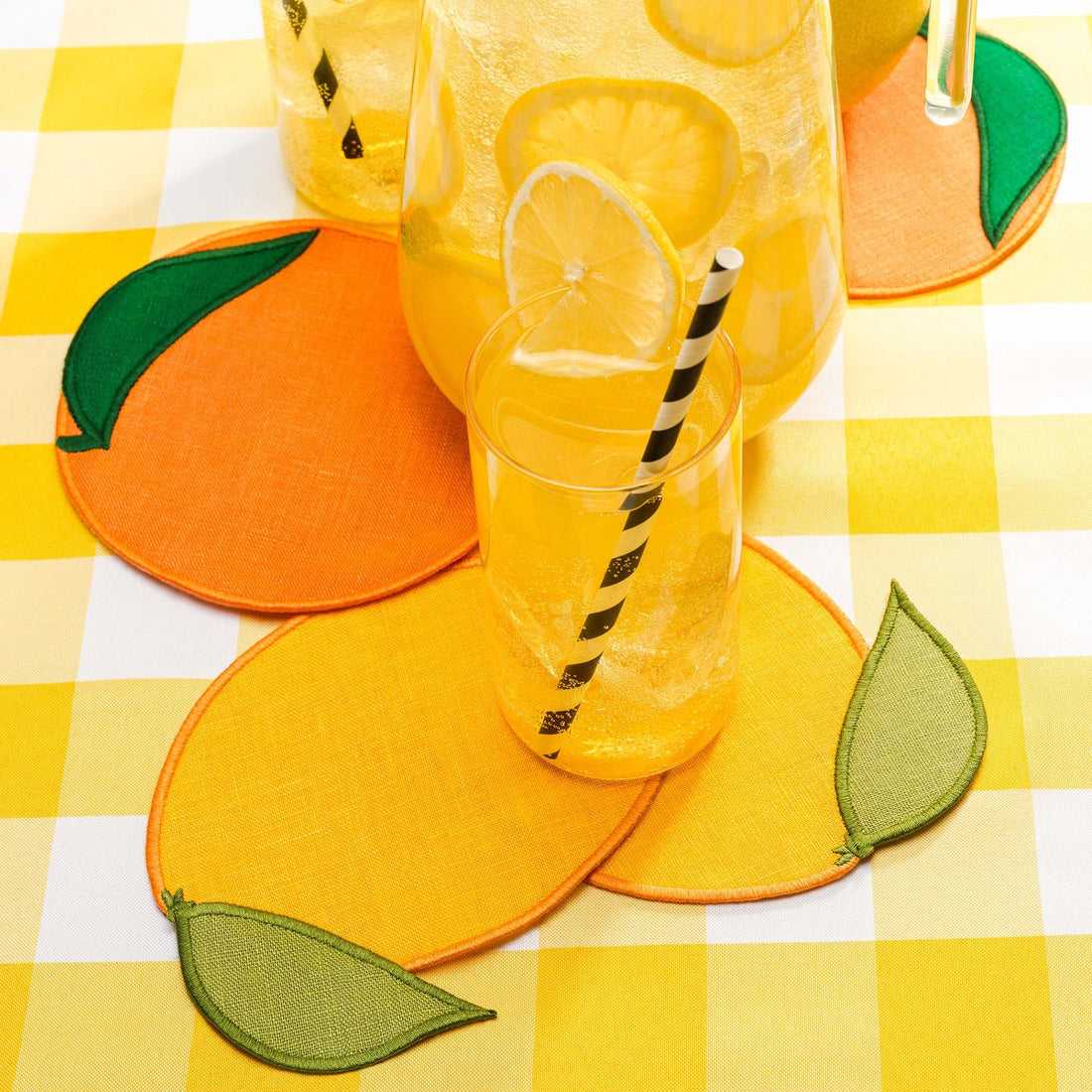 Set of four citrus-shaped cocktail napkins made of linen