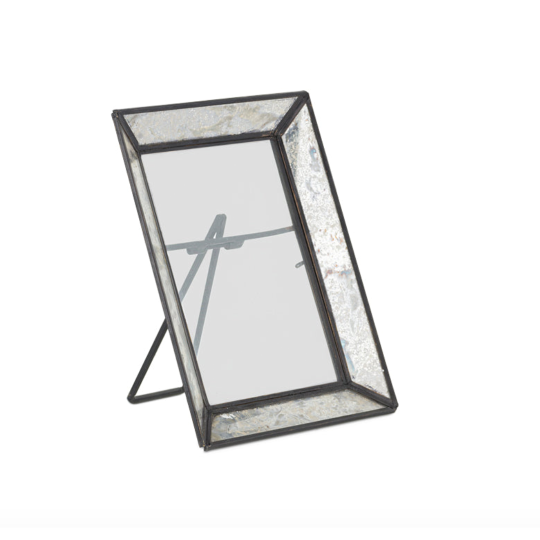 Side view of Yash Antique Glass & Iron Photoframe showing antiqued black iron frame and antique glass edges on a white background.