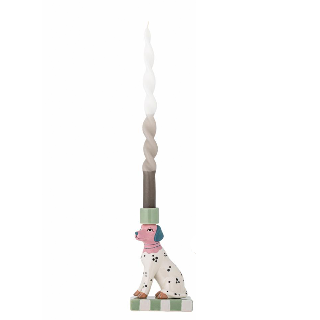 Decorative candle holder with a dog figurine on a white background