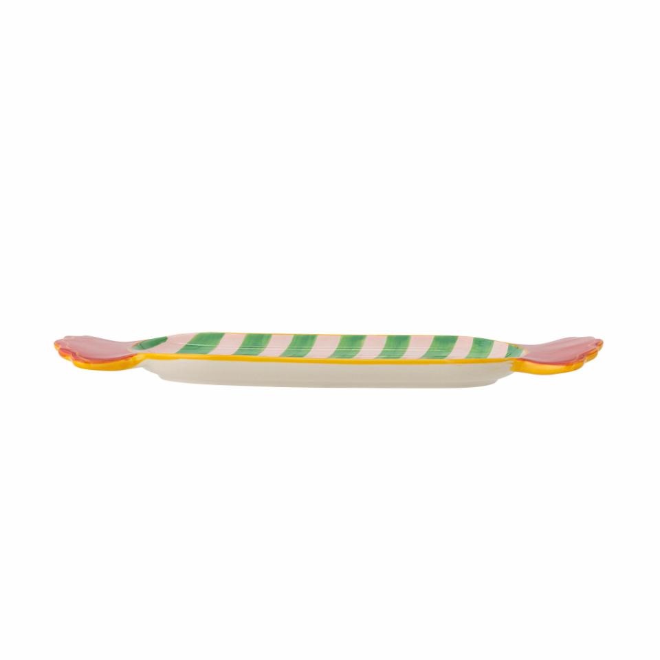 side view of the Striped green Caramella-shaped serving plate on a white background, hand-painted and vibrant tableware for appetizers or desserts.