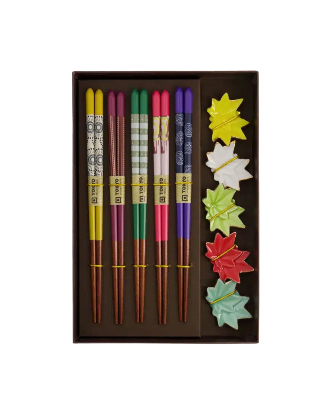 10 reusable chopsticks with 5 leaf-shaped porcelain rests being used for sushi”