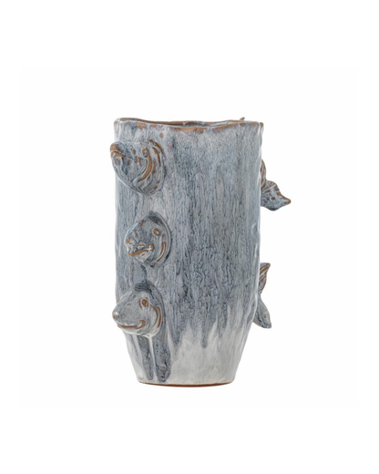 Side view of the Stoneware fish vase with three decorative fish and blue reactive glaze