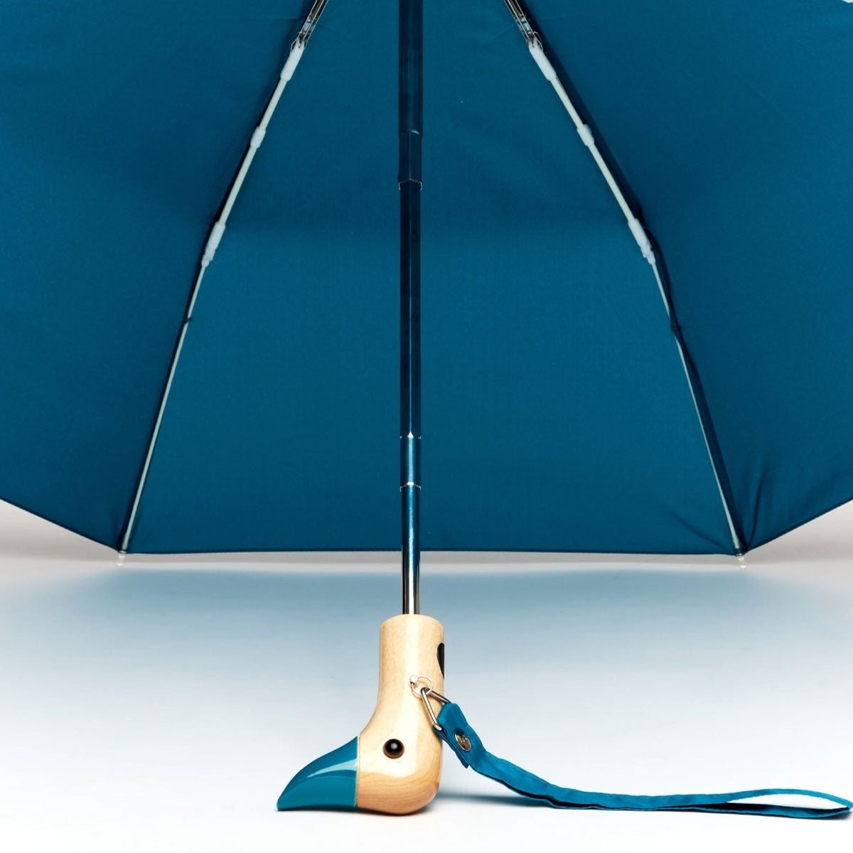 Close-up of the  teal duck compact umbrella