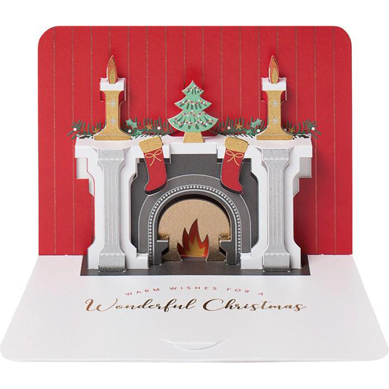 3D Christmas card featuring festive fireplace with decorations, die-cut and cold foil finish, 280gsm textured card, white envelope, made in the UK